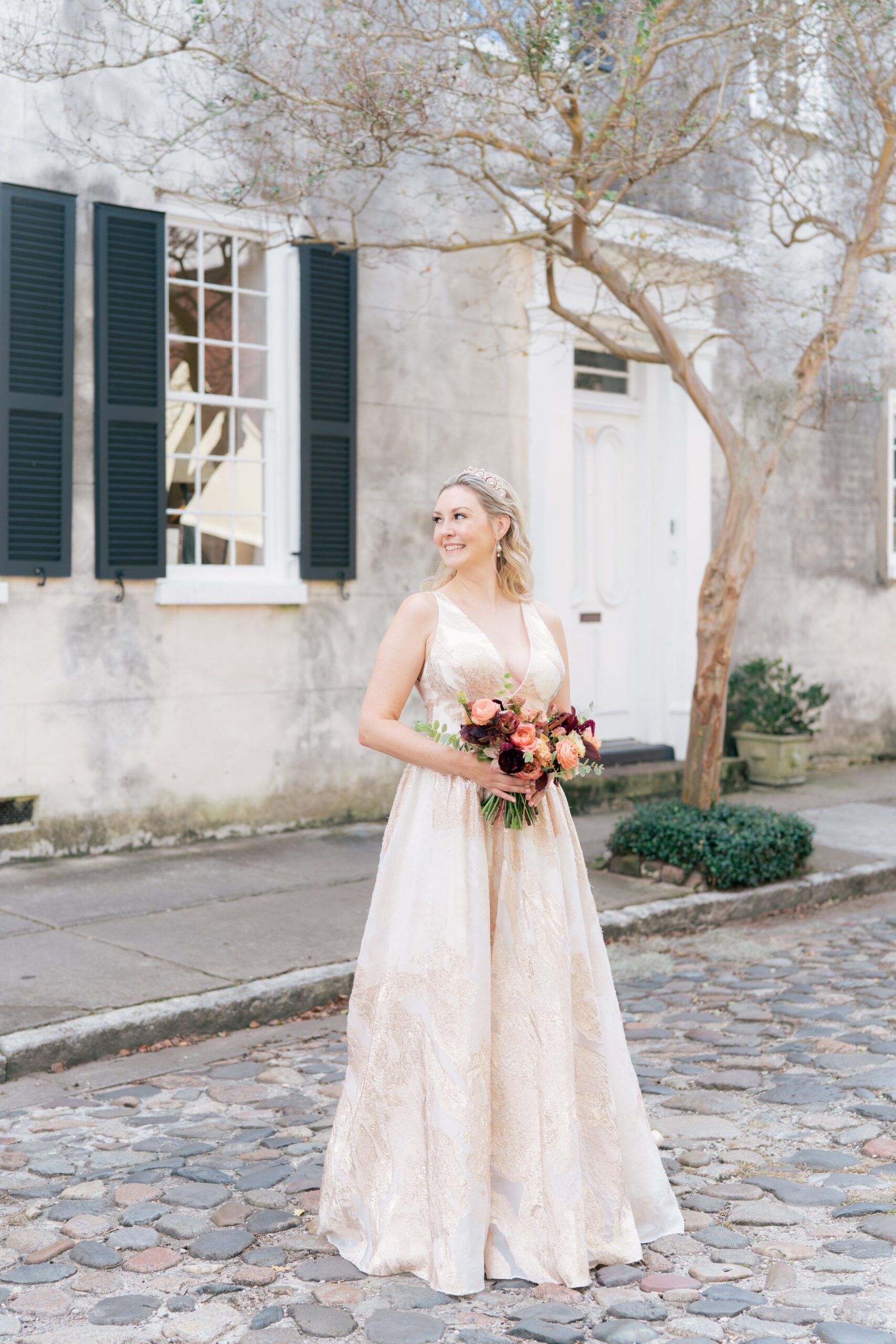 bride in metallic pink dress on cobblestone chalmers street