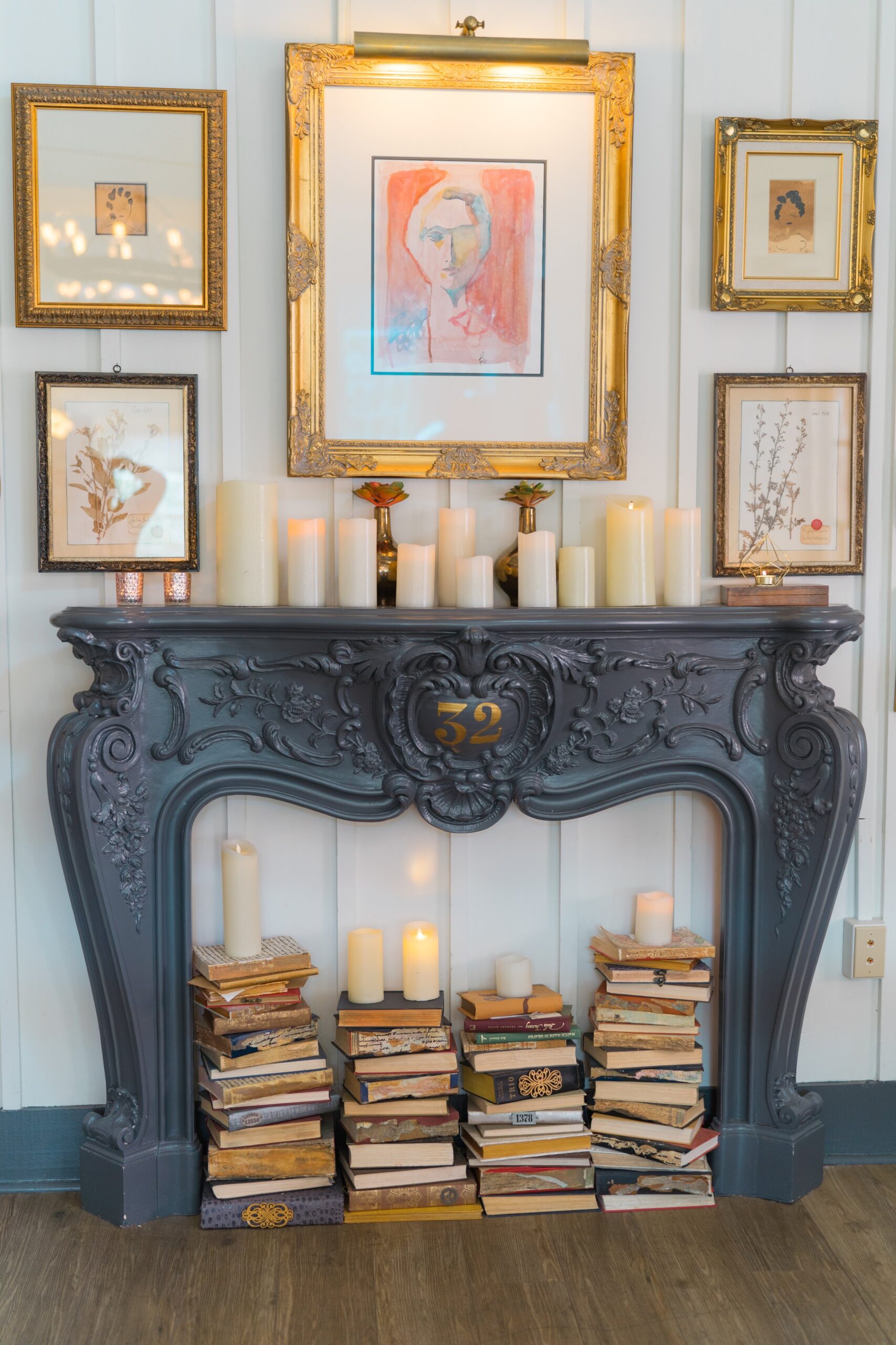 parcel 32 fireplace with books.