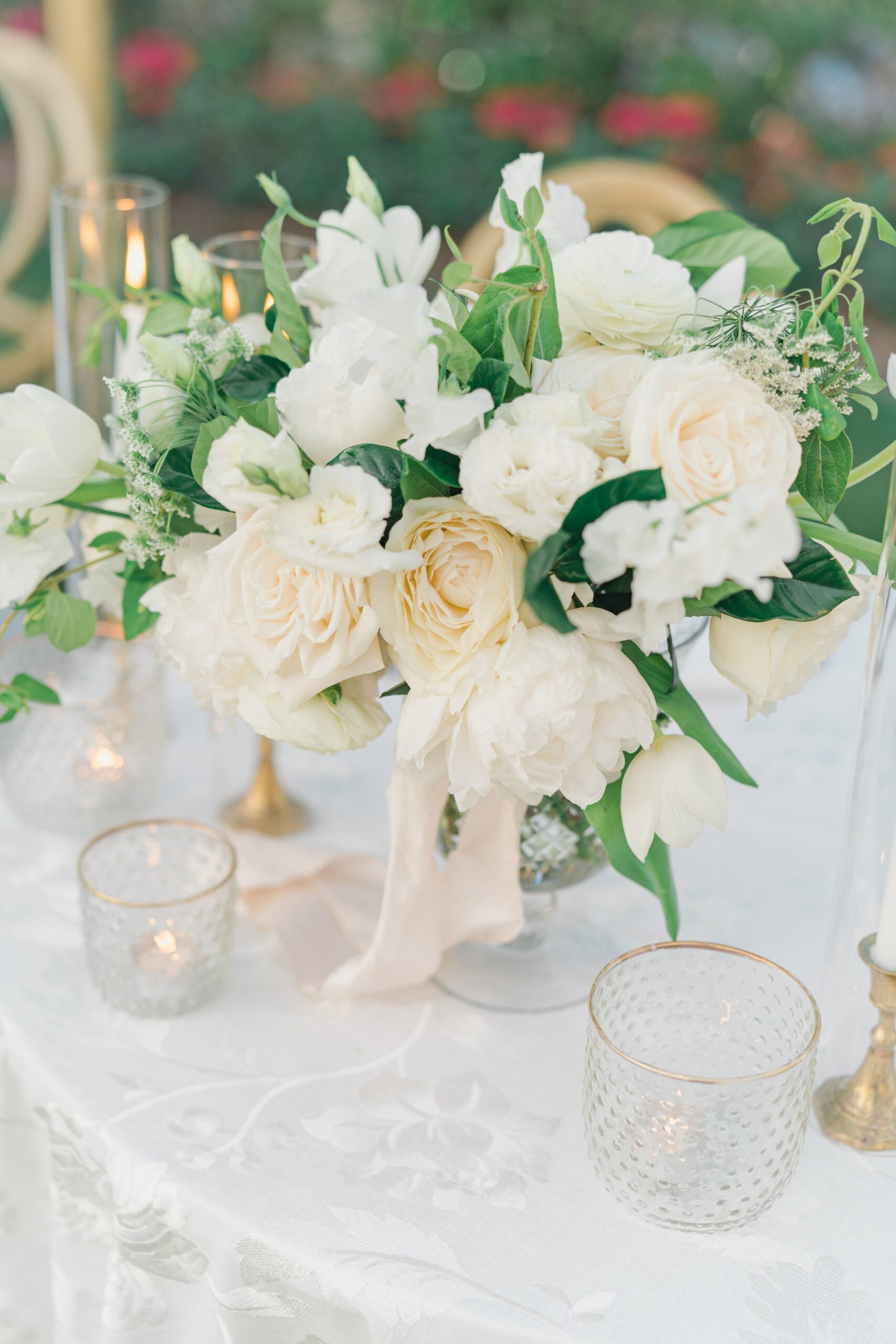 Sweetheart table flowers. Charleston wedding photographer.