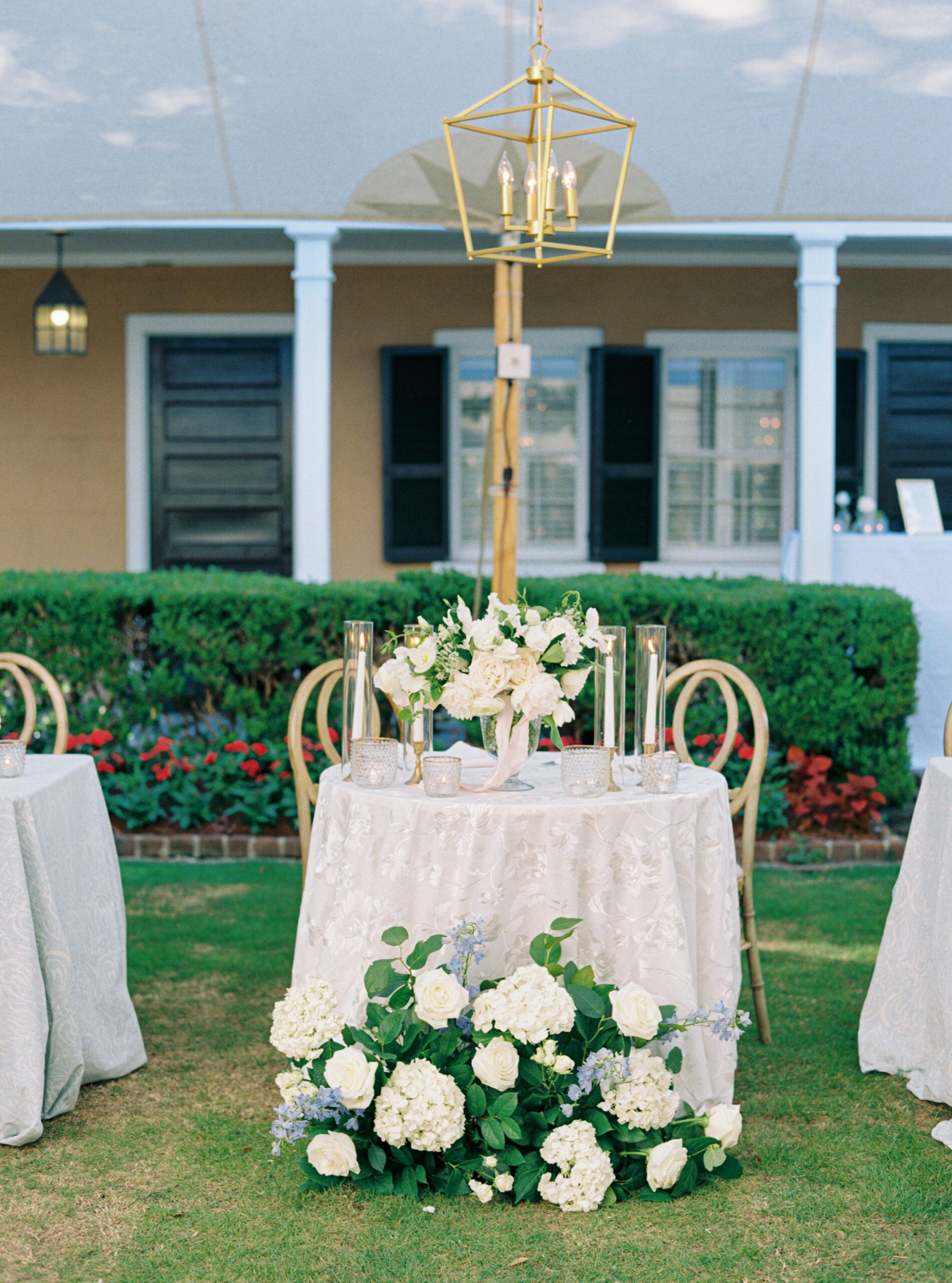 Sweetheart table outdoor wedding reception in Charleston.