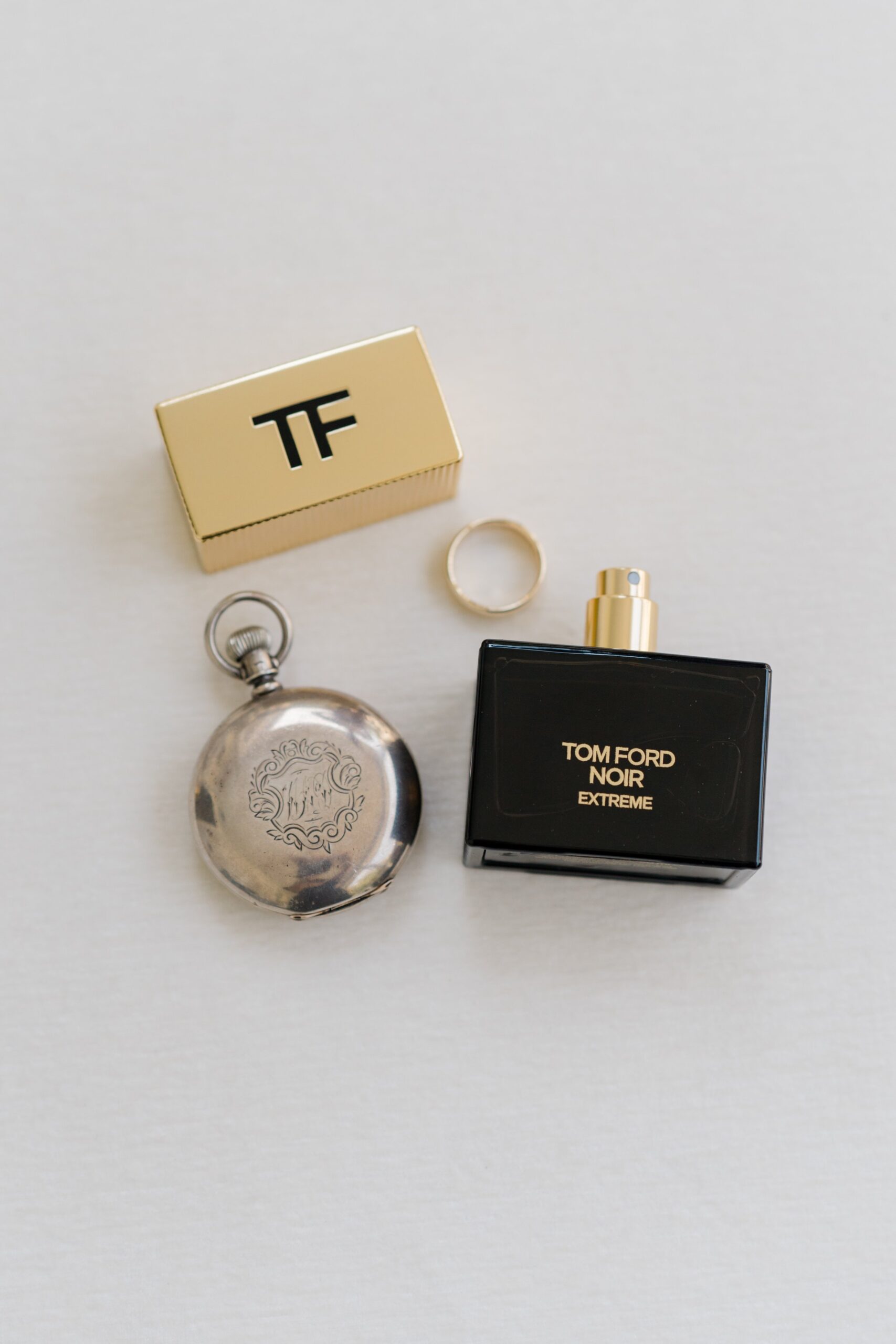 Tom Ford groom details with vintage pocket watch from grandfather