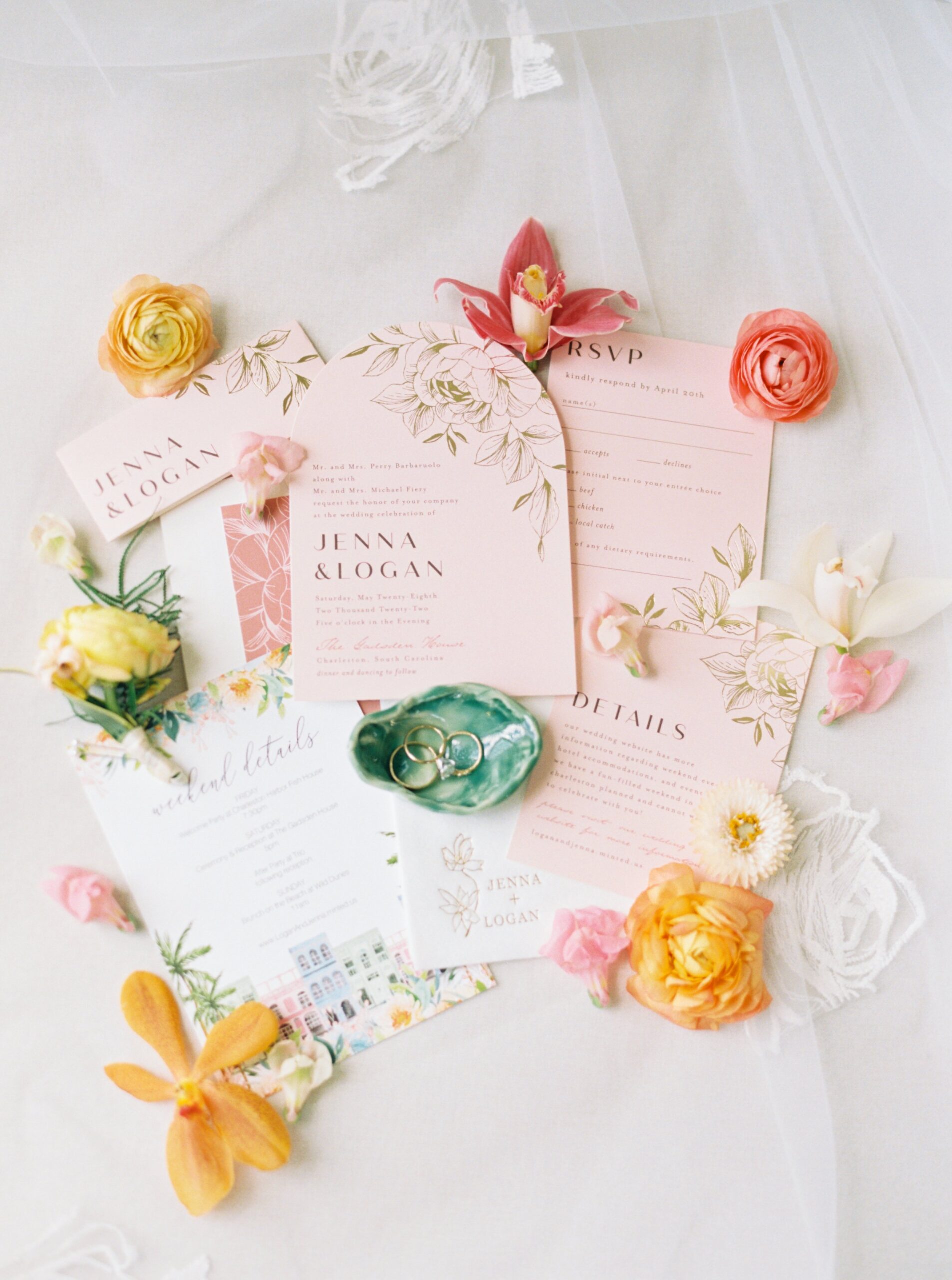 Wedding flat lay with tropical florals and rose gold metallic lettering