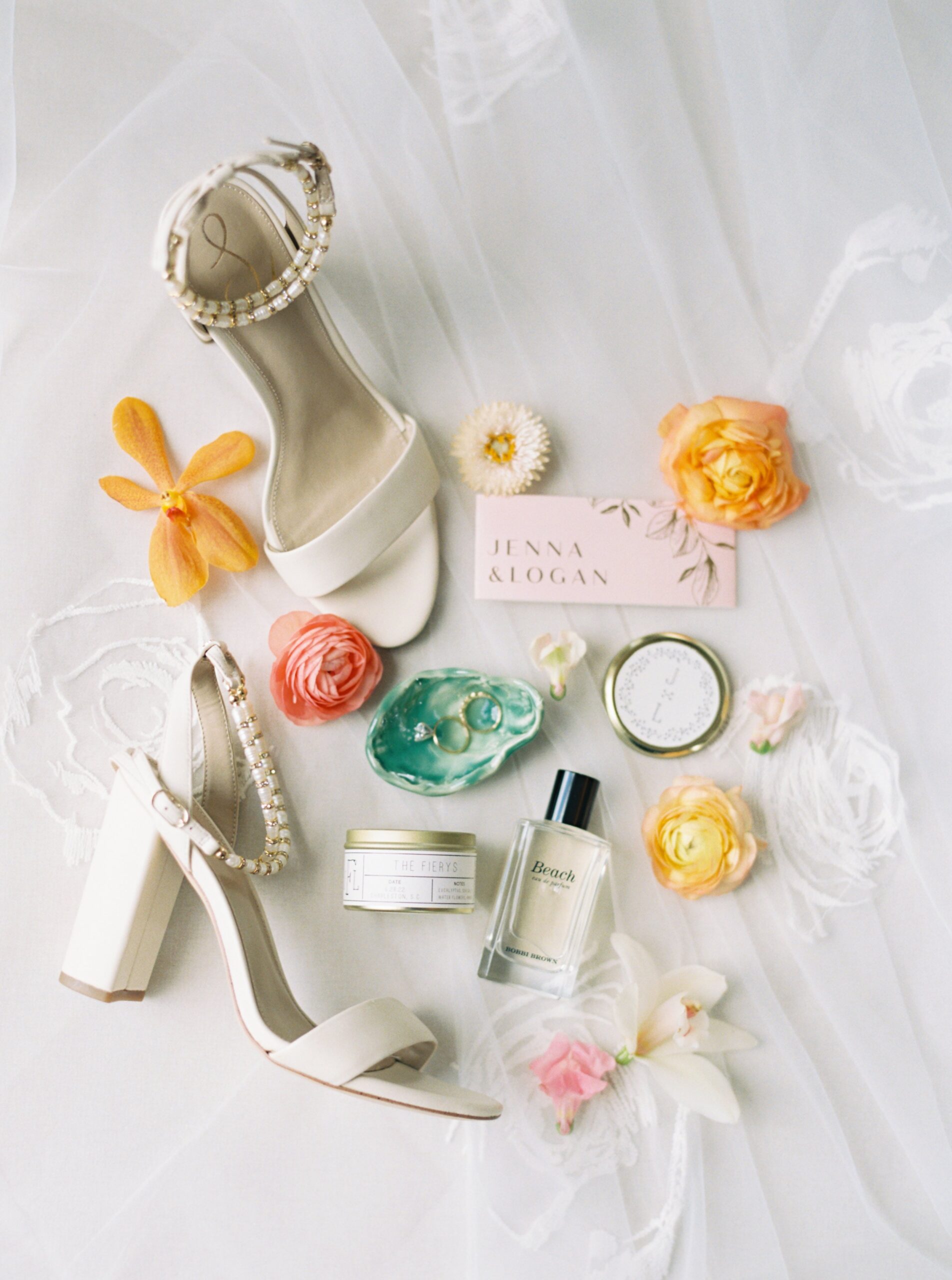 bridal details with wedding day heels and perfume. film photography.