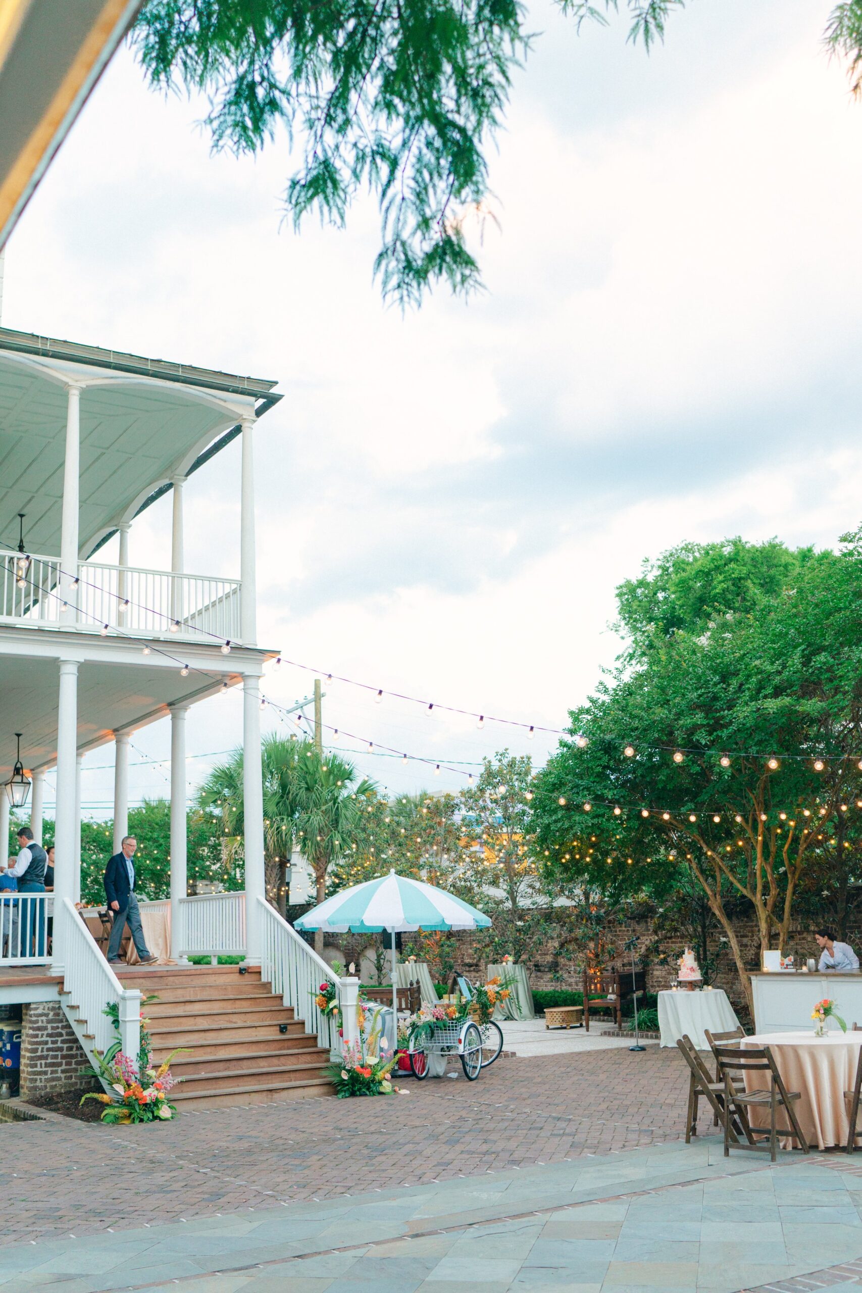 Gadsden House outdoor wedding reception with string lights.