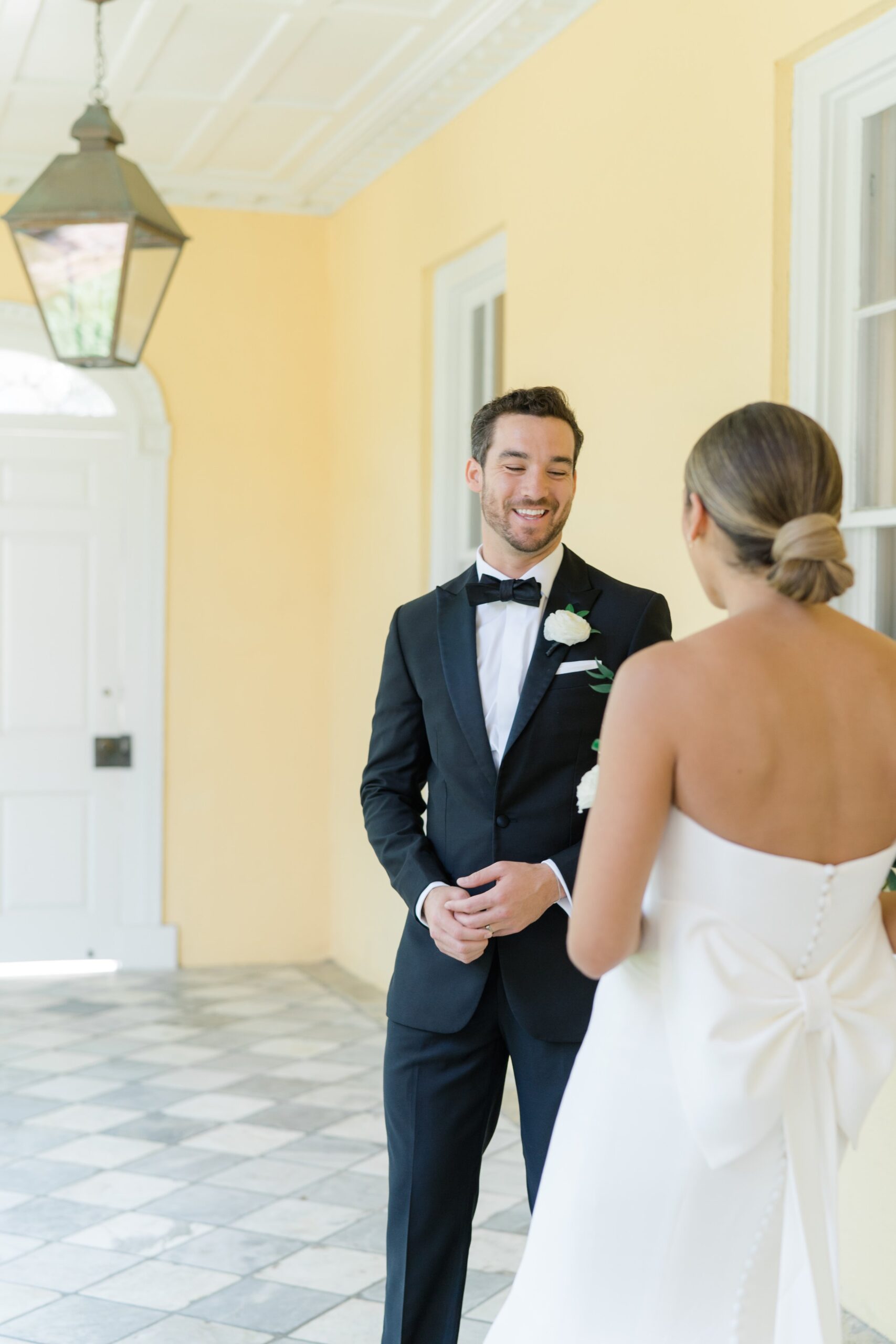 Groom sees bride for the first time on wedding day.