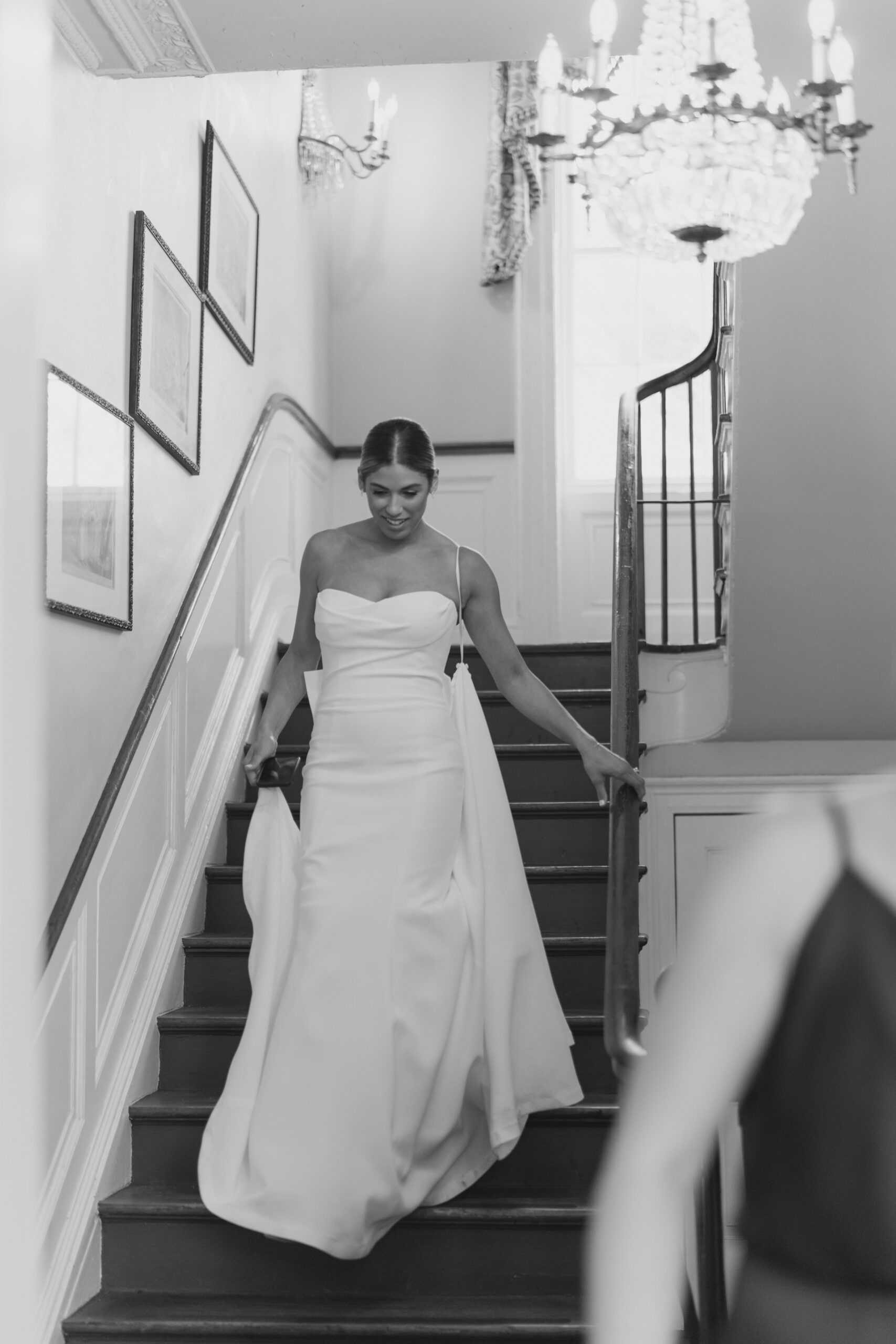Bride coming down the stairs.
