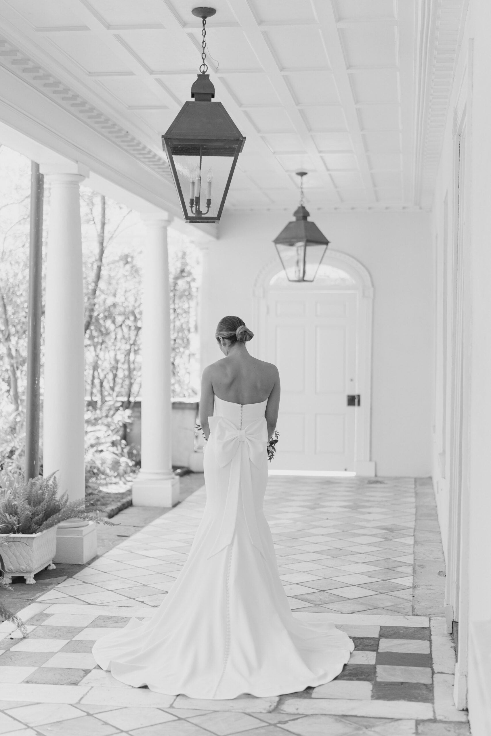 Black and white wedding day photo of bride.