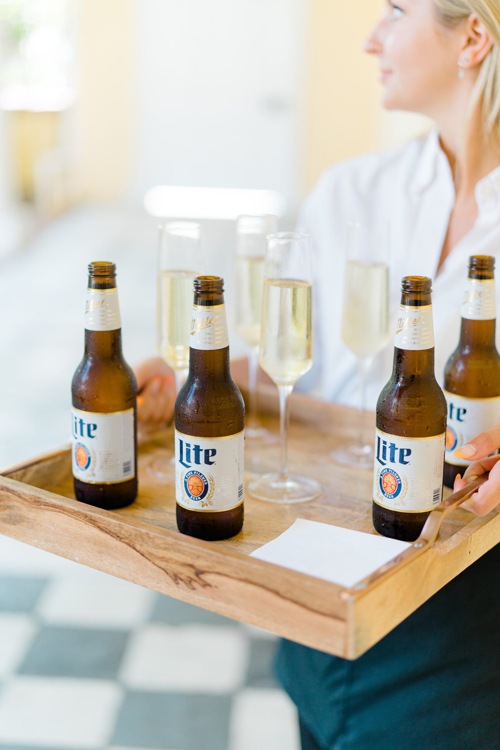 Champagne and miller lite wedding reception drink tray. Grooms favorite beer.