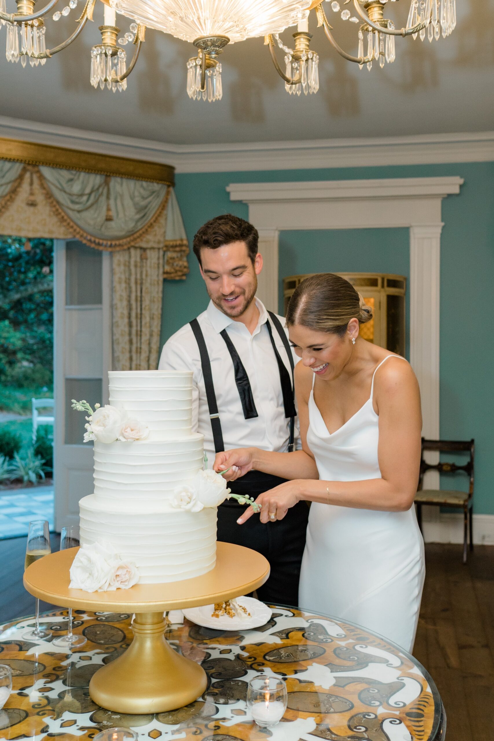 William Aiken House wedding cake cutting.
