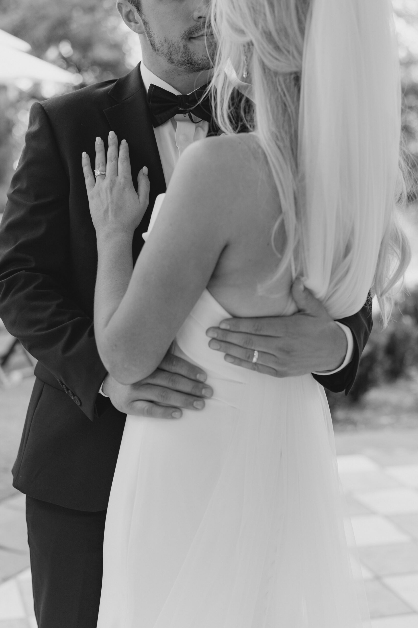 newlywed ring detail photo. black and white wedding photo.