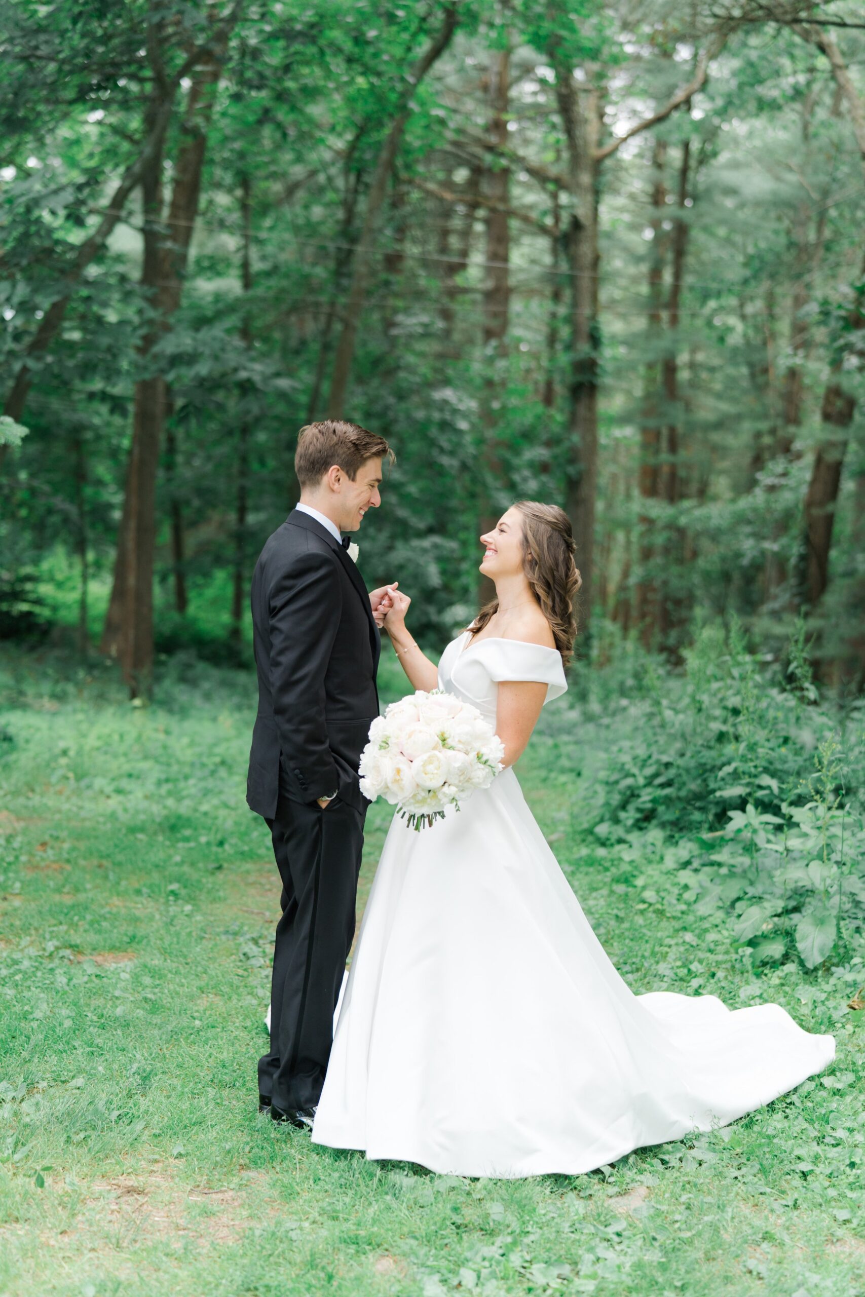 Bradley Estate Wedding. Bride and groom share cute moment during wedding day portraits.