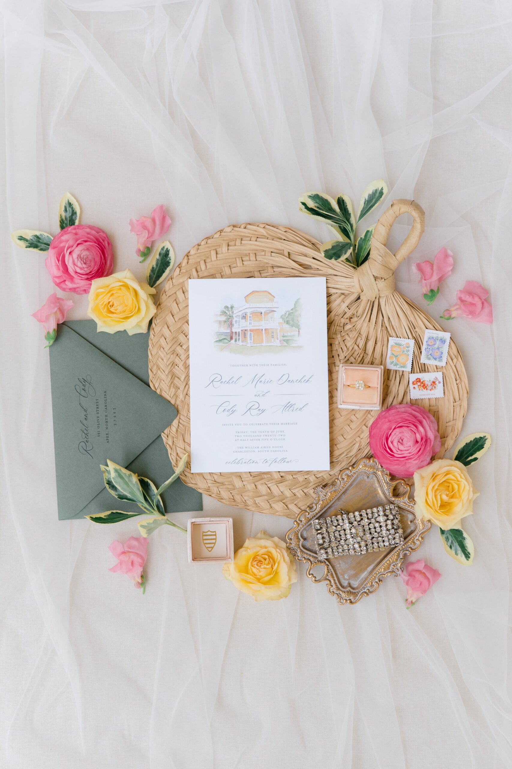 pink and yellow watercolor invitation suit with palm leaf hand held fan
