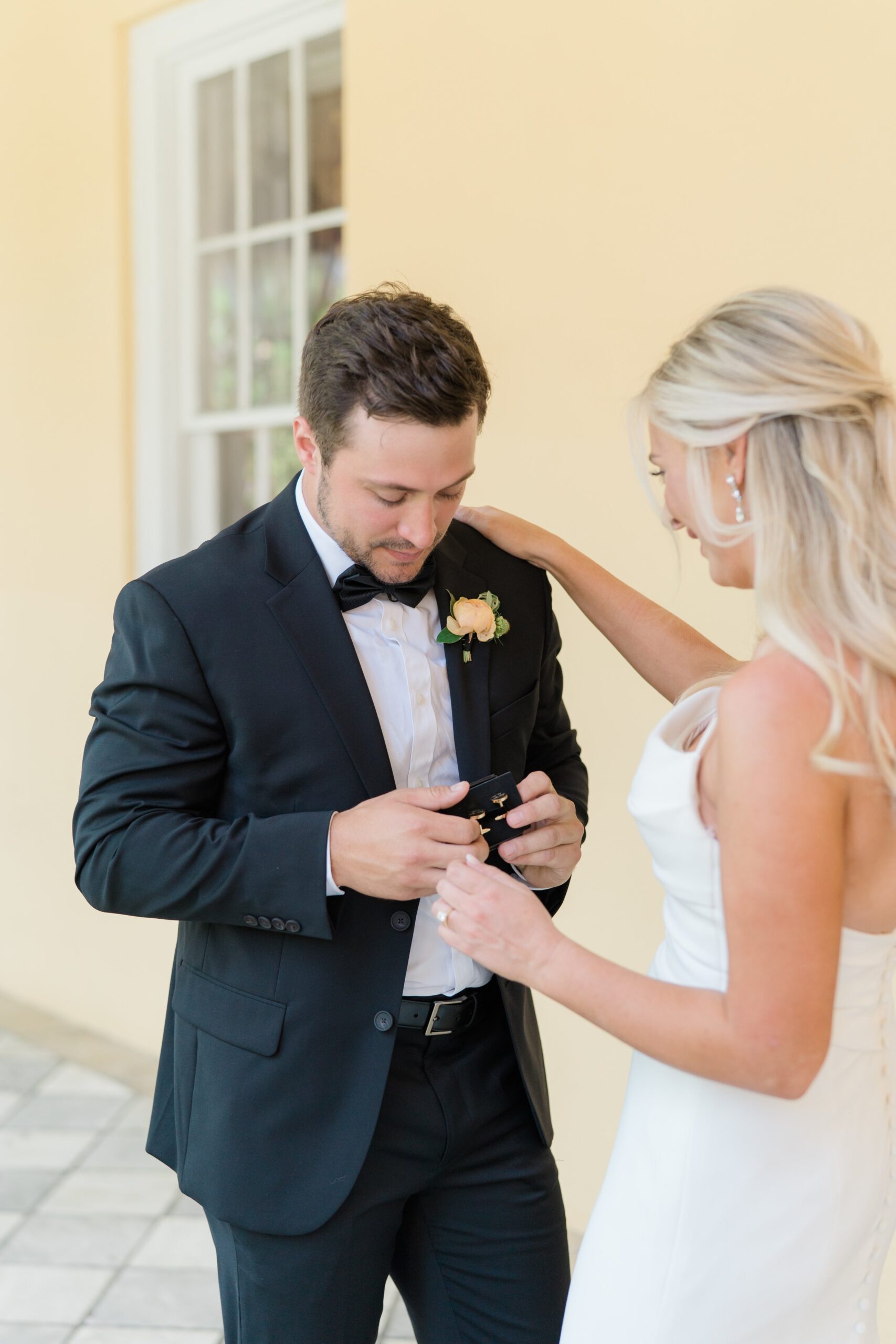 groom sees gift from bride for the first time.