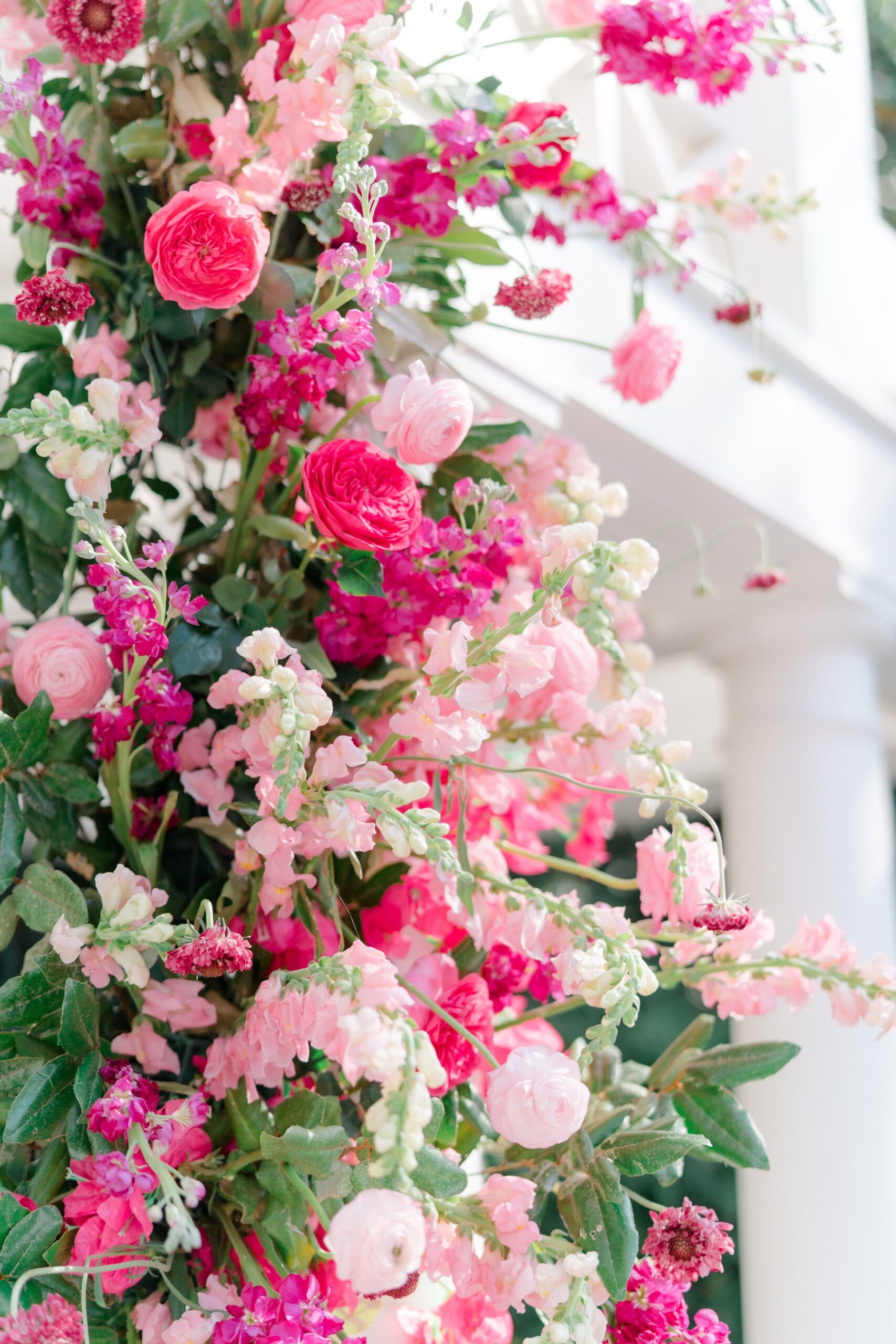lush pink flowers and greenery at charleston spring wedding.