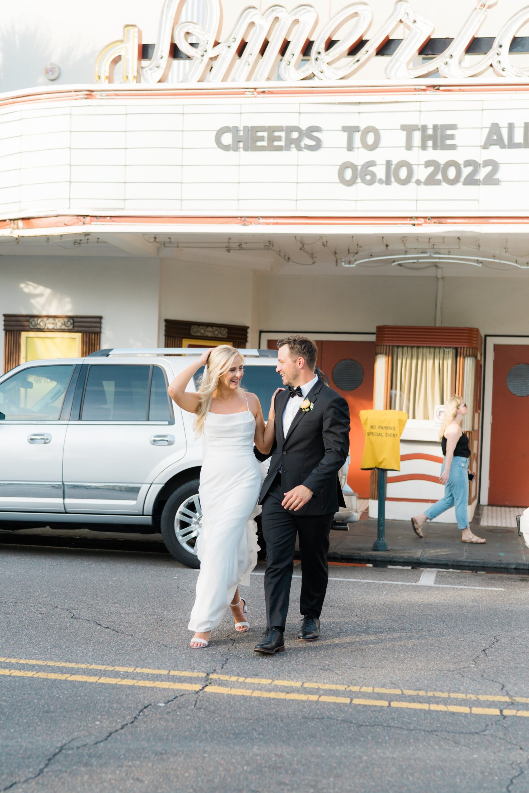 custom wedding marquee with bride and groom crossing king street