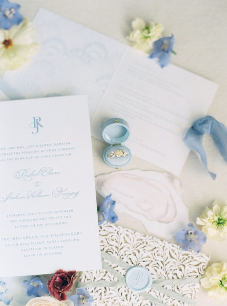 Soft coastal blue wedding details. Oyster shell watercolor. 