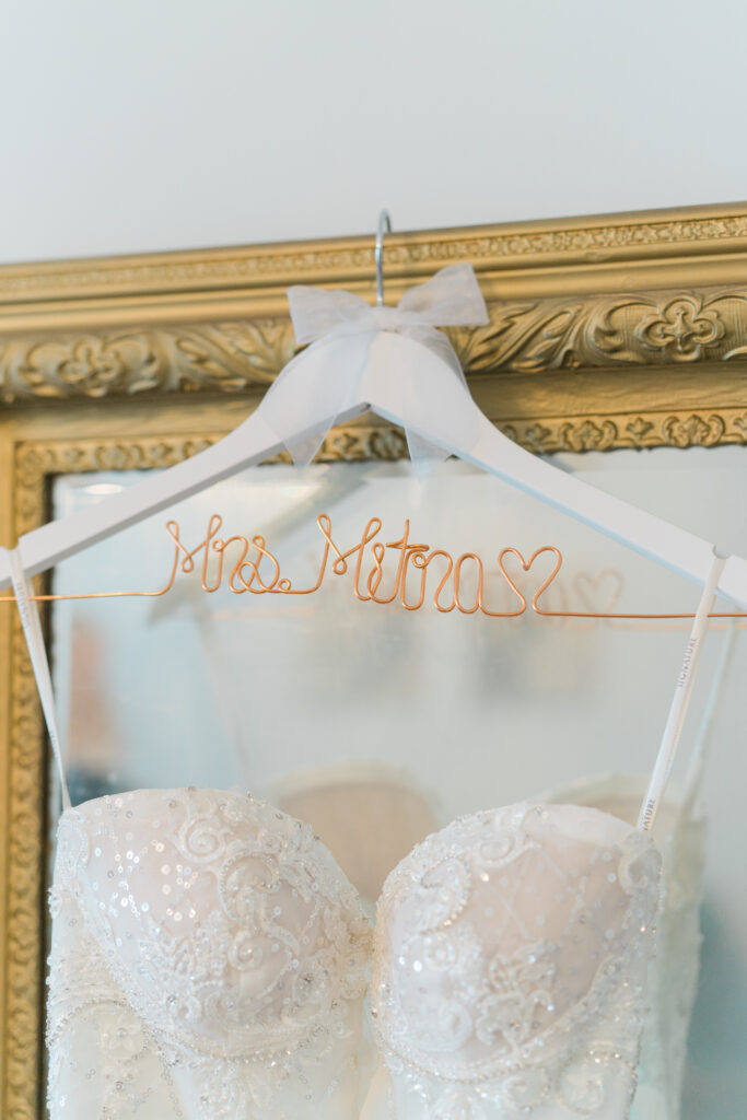 Custom hanger for wedding dress.