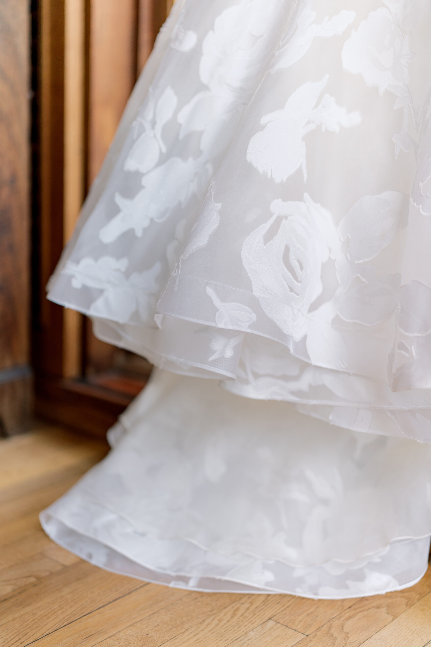 Bottom of the wedding dress floral details. 