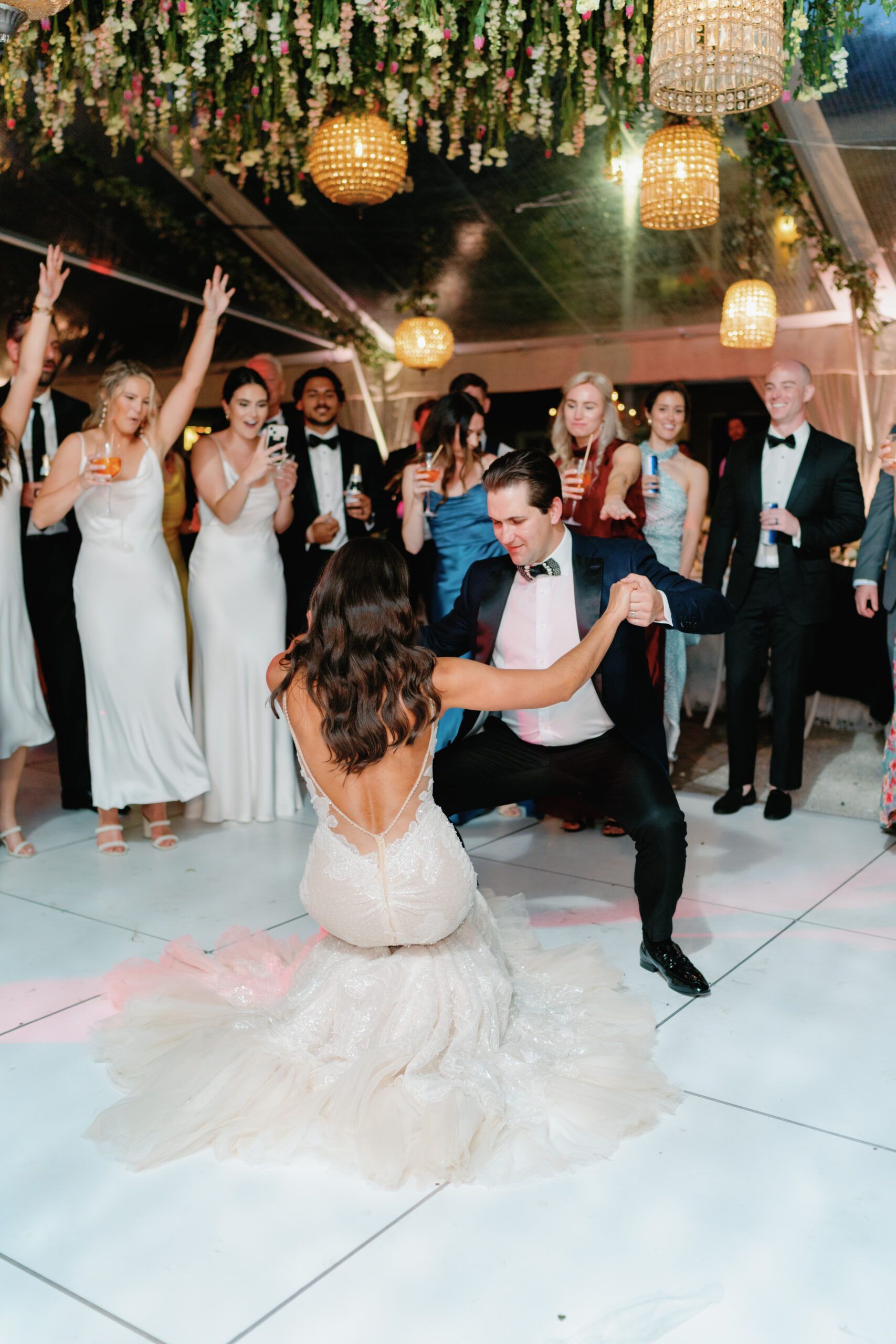 Bride and groom take over the dance floor.