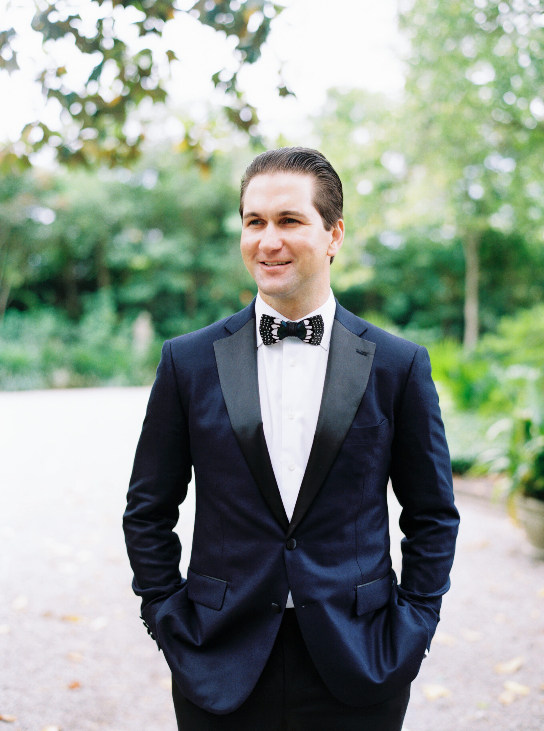Charleston groom in blue tuxedo and brackish bow tie.