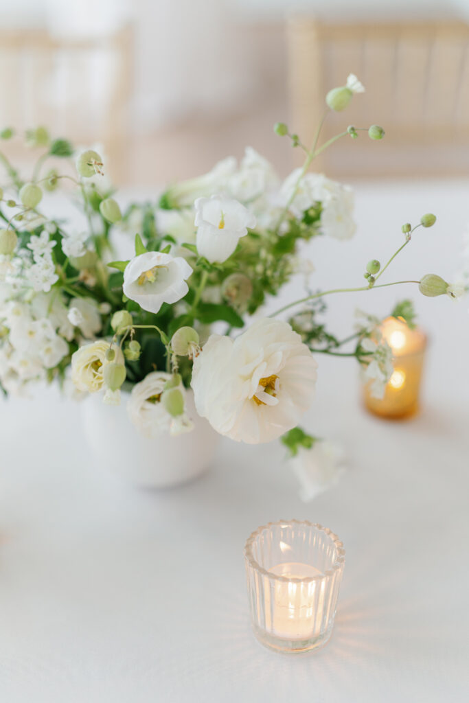 White and green table flowers. Dewberry hotel.