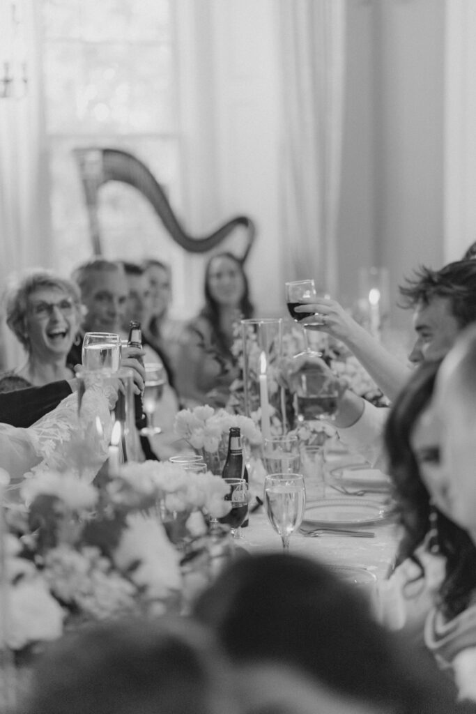 Black and white photo of wedding toast. 