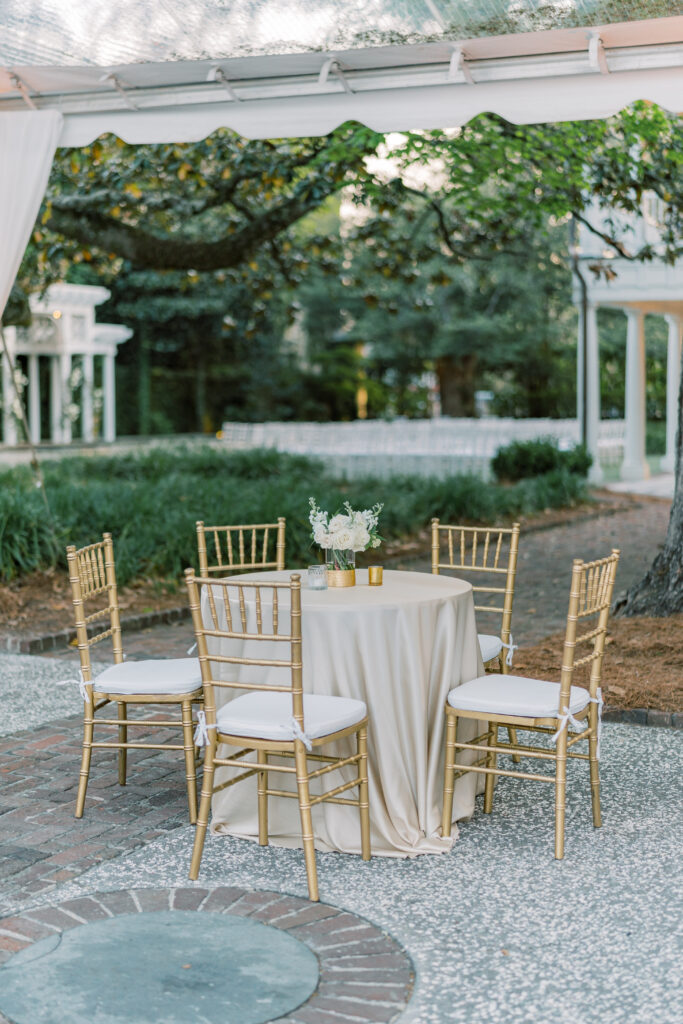 Gold and tan wedding reception table. Charleston spring wedding.