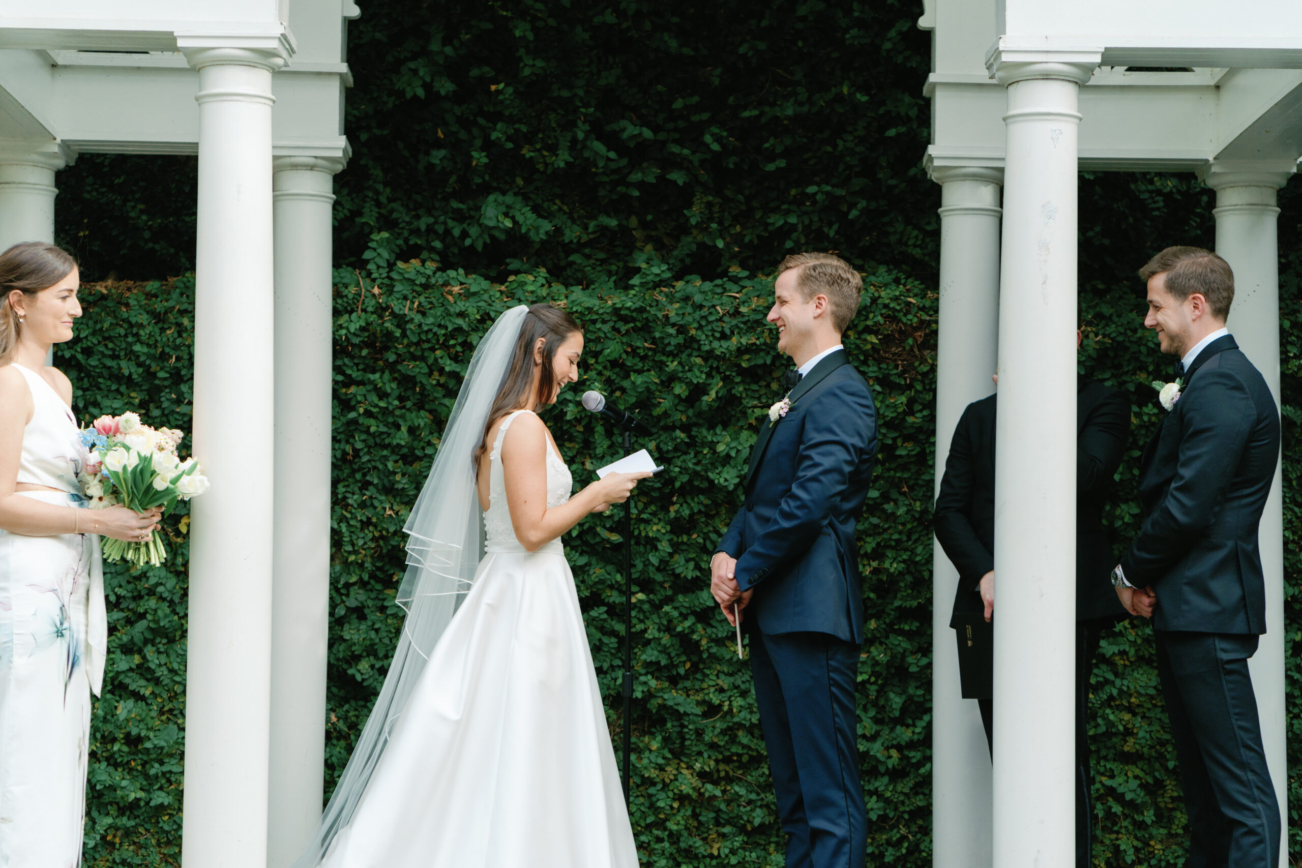 Wedding vows during ceremony at William Aiken House. 