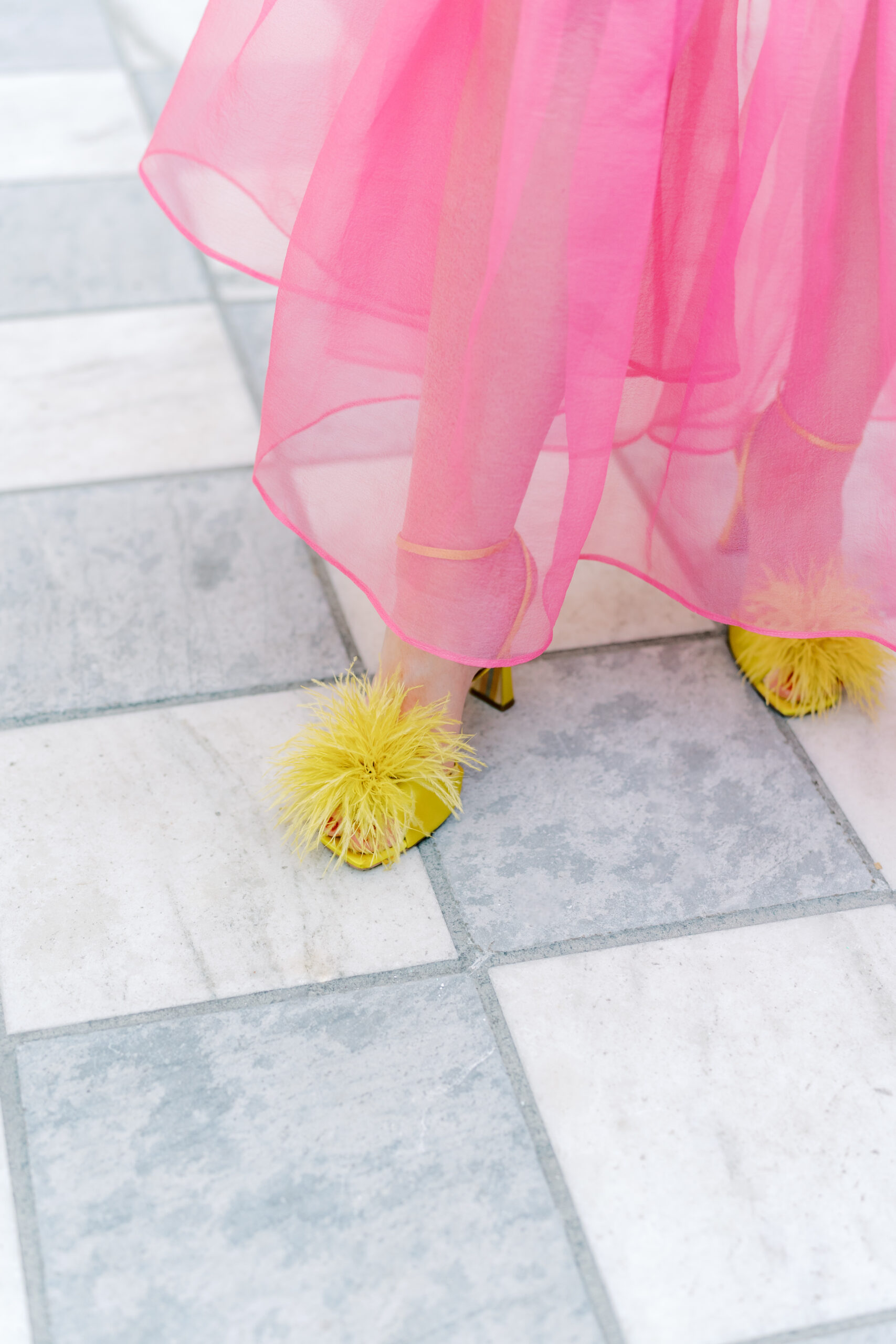 Fluffy yellow wedding guest heels.