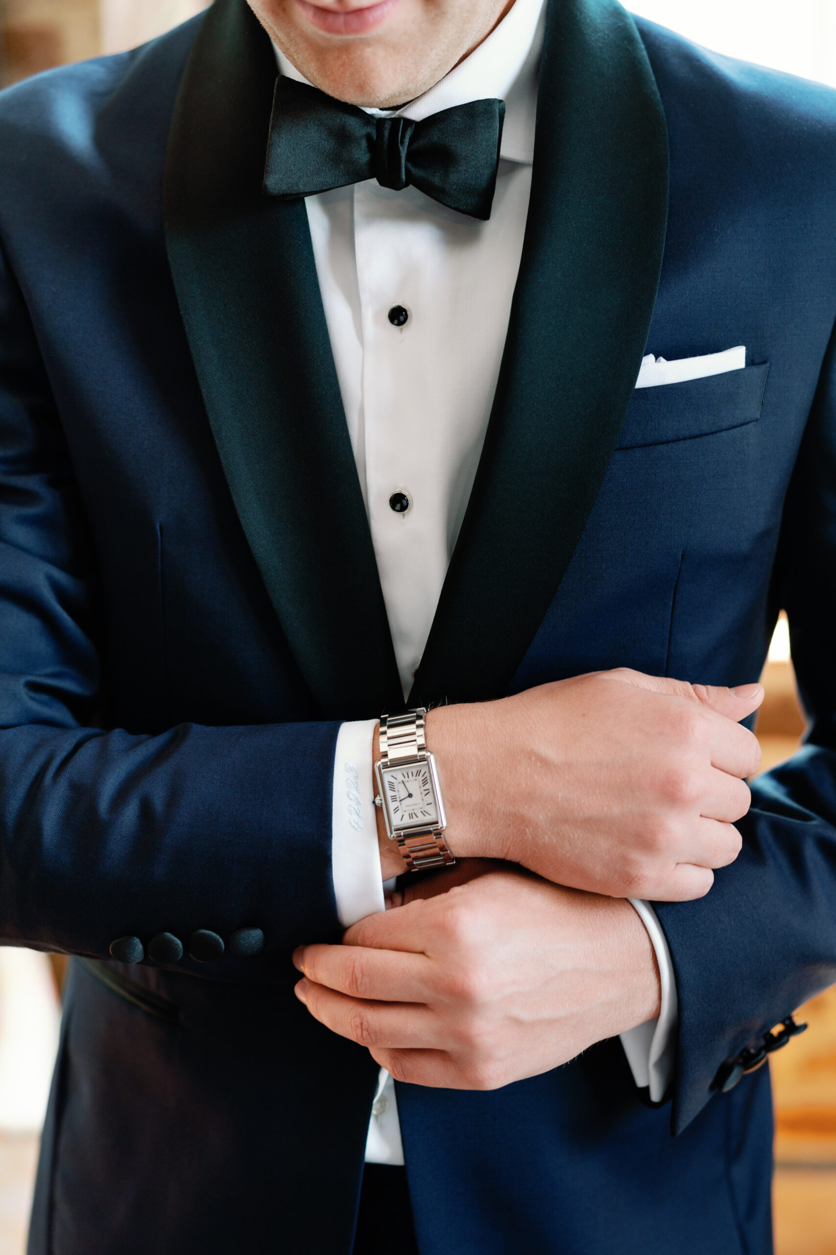 Groom with cartier watch.