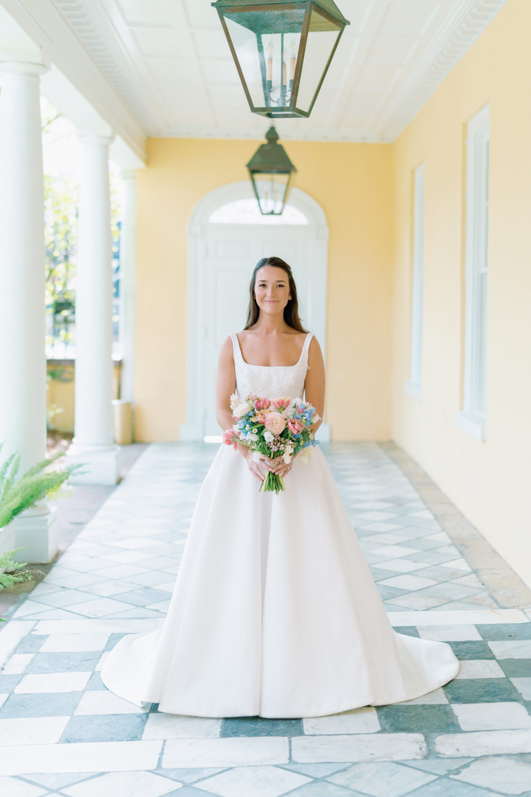 Charleston spring bride with pink blue and white flowers. 