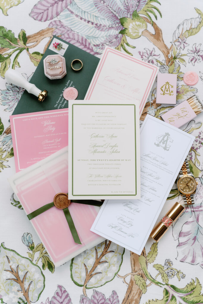 Spring wedding invitation, menu, and matchbox for William Aiken House destination wedding.