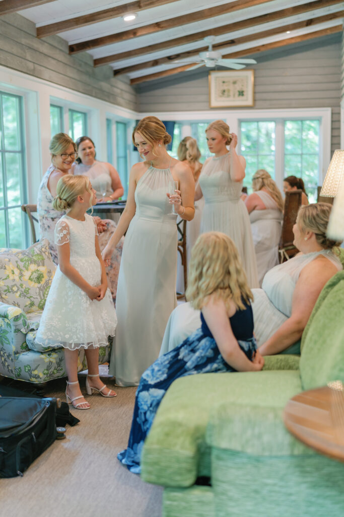Bridesmaids and flower girl in the cottage at the farm at old edwards. 
