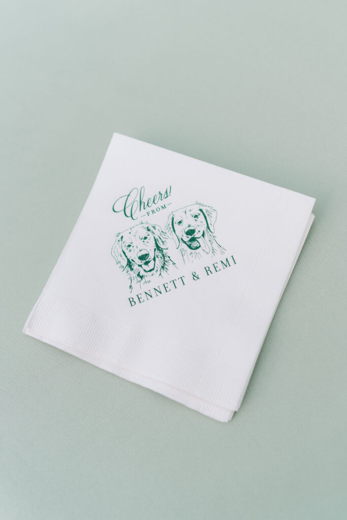 Cocktail napkins with golden retrievers at summer destination wedding in highlands nc. 