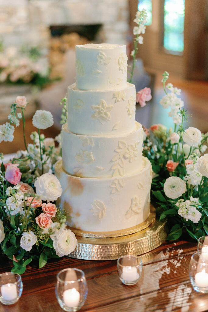 4 tiered white wedding cake. 