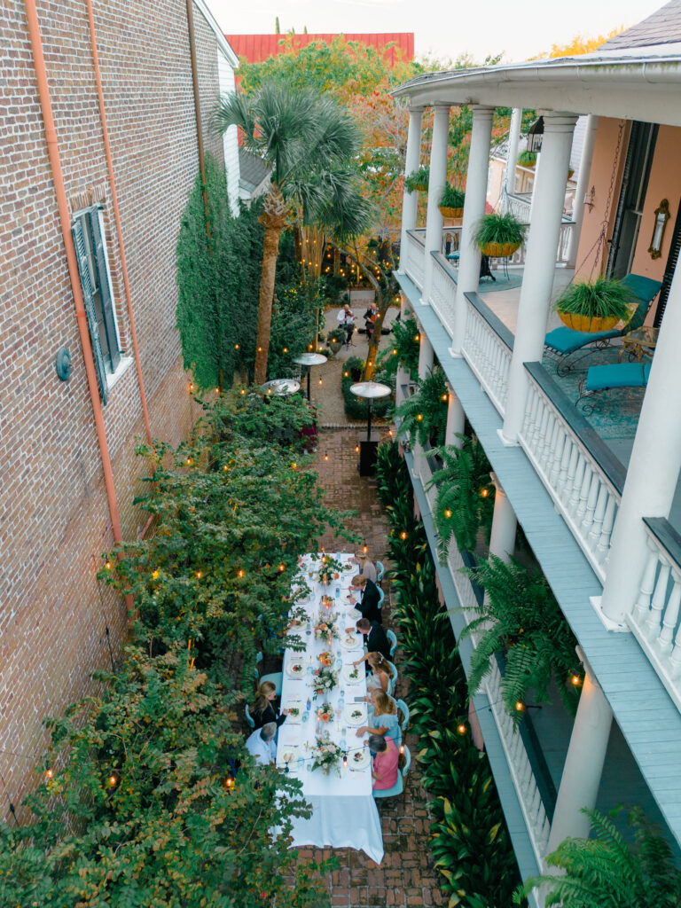 Drone photo from above of dinner time at fall wedding at the Parsonage Inn. 