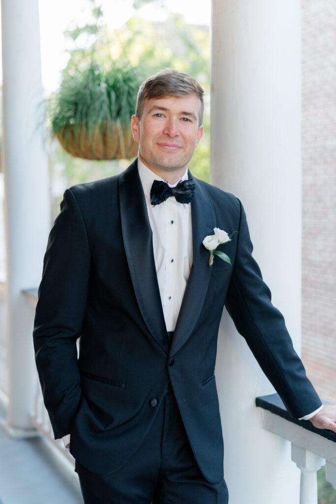 Charleston groom in black brackish bowtie. 