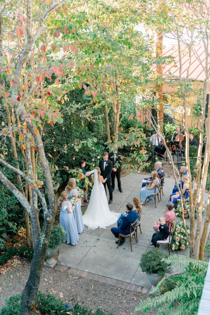 View of intimate wedding ceremony from above. 