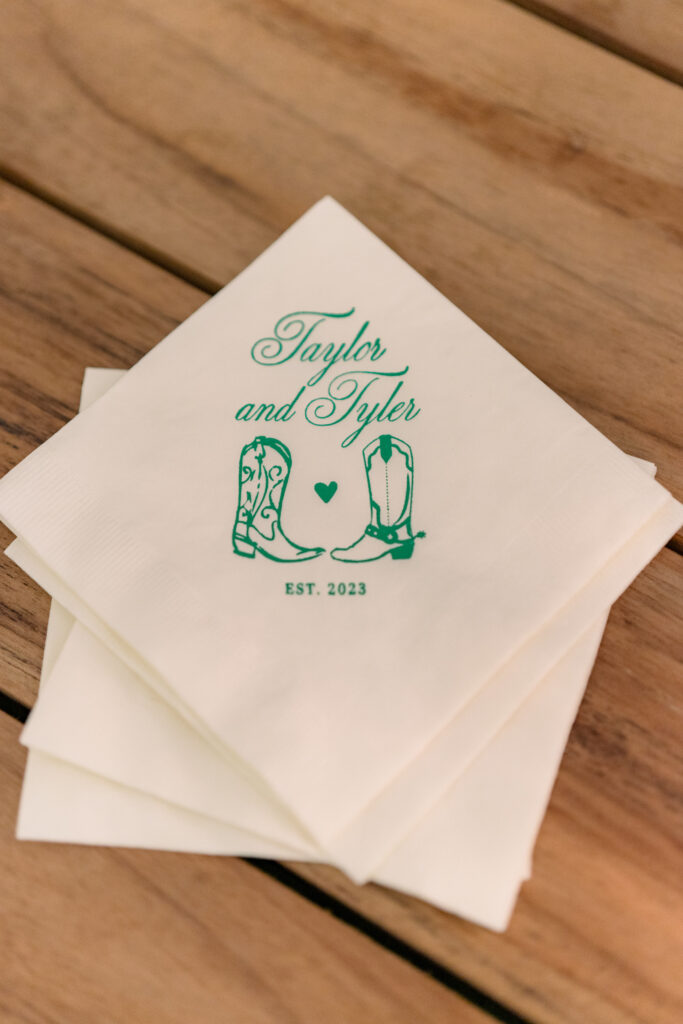 Couple from Texas themed bar napkins with cowboy boots. 