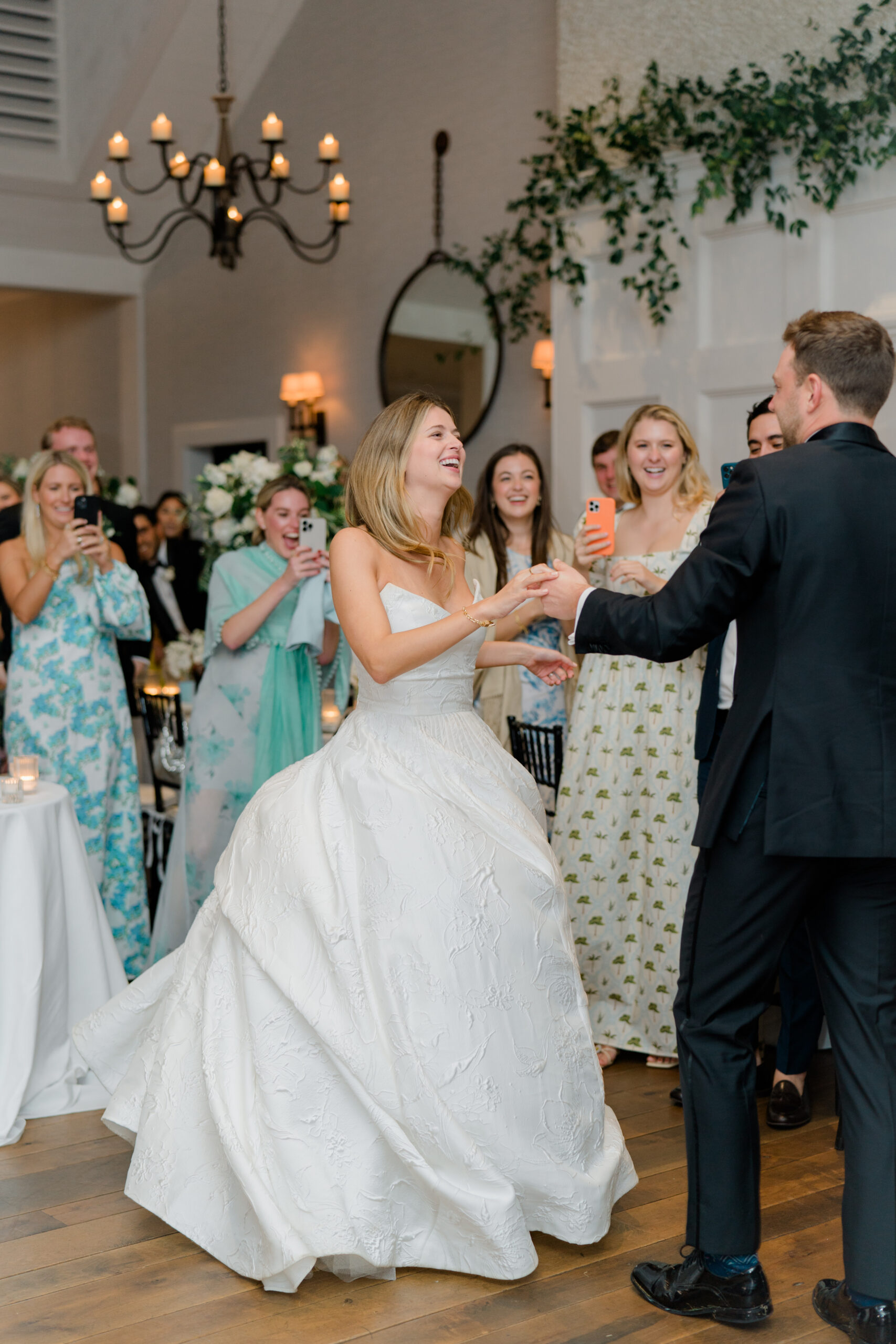 Bride's dress does perfect twirl after grand entrance at wedding ceremony. 