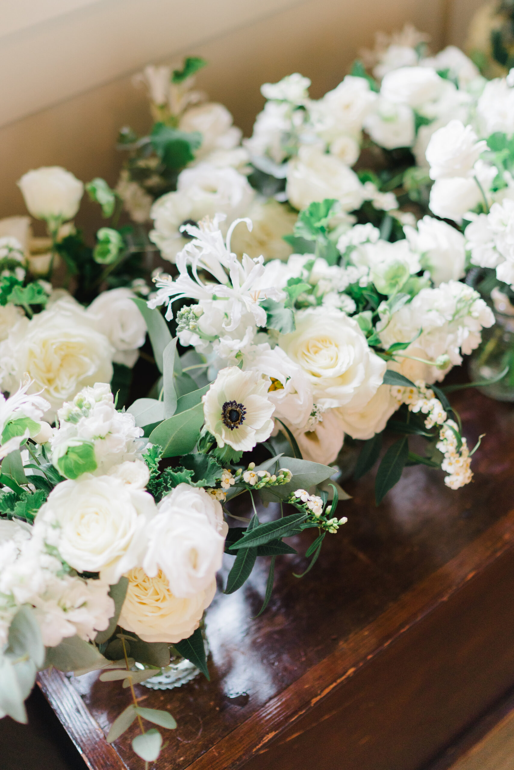 White and green bride and bridesmaids flowers. 