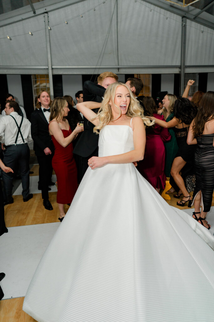 Bride spinning on the dance floor. 