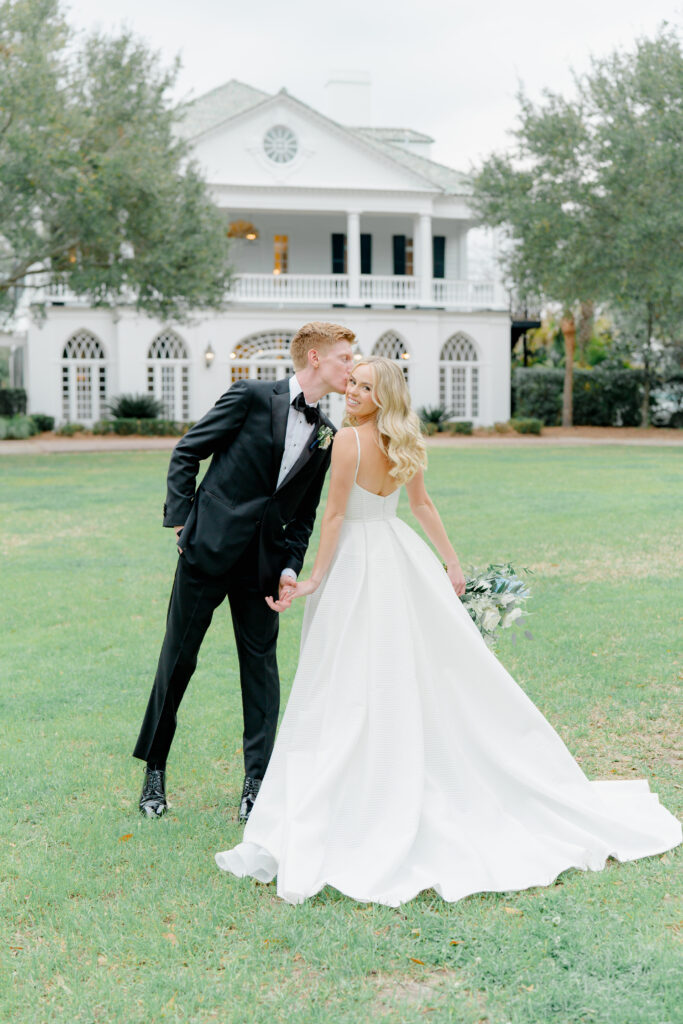 Newlywed photos on the front lawn at Lowndes Grove. 