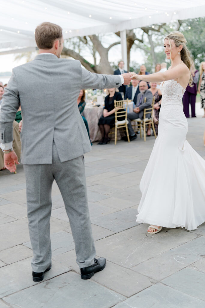 Bride spins during first dance.