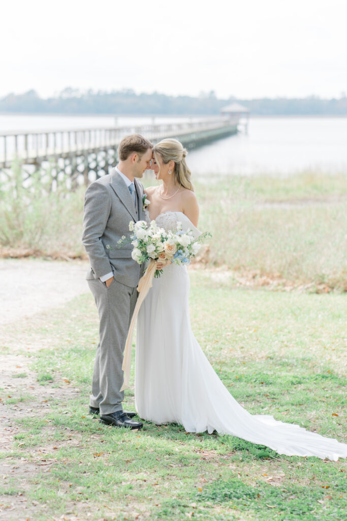 Wedding day portraits by the water. Lowndes Grove.