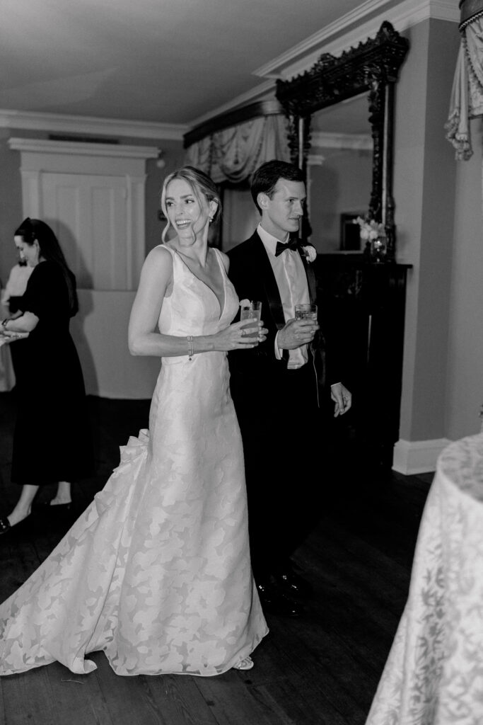Black and white candid wedding photo. 