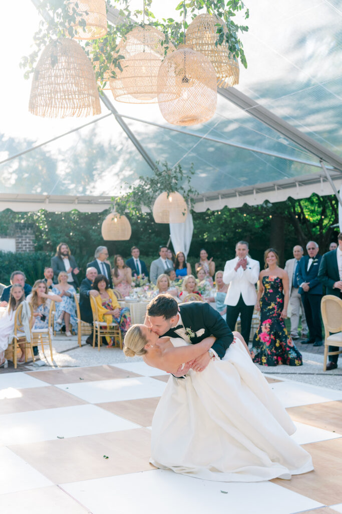 Bride and groom first dance dip kiss. Pink and yellow wedding at Governor Thomas Bennett House. 