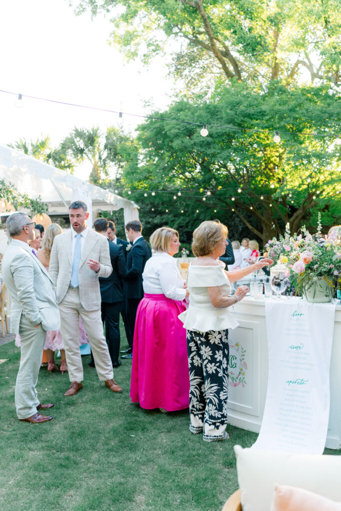 Golden hour during garden wedding reception at Thomas Bennett House. 