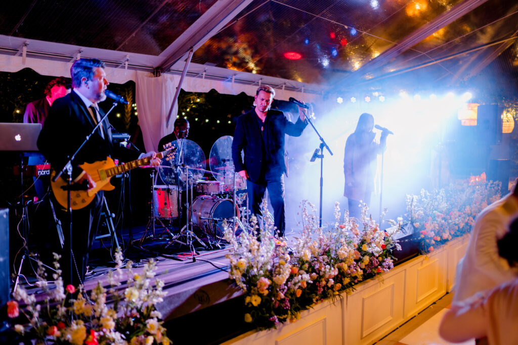 Live band at outdoor wedding reception. 