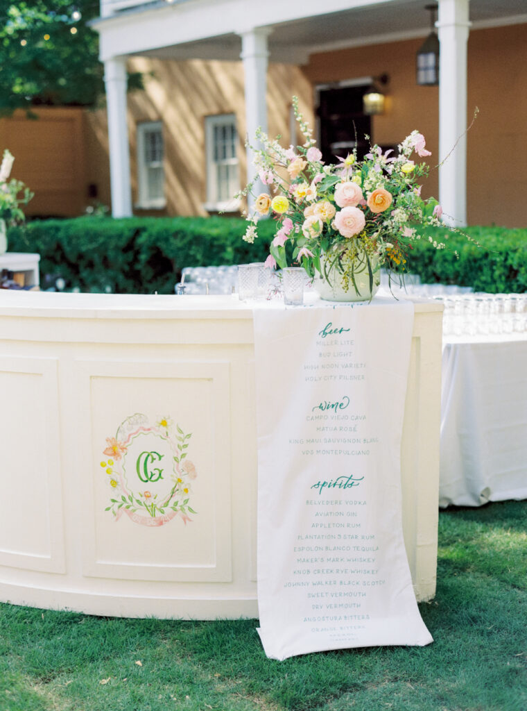 Film photo of outdoor bar. Outdoor spring wedding reception in Charleston, SC. 